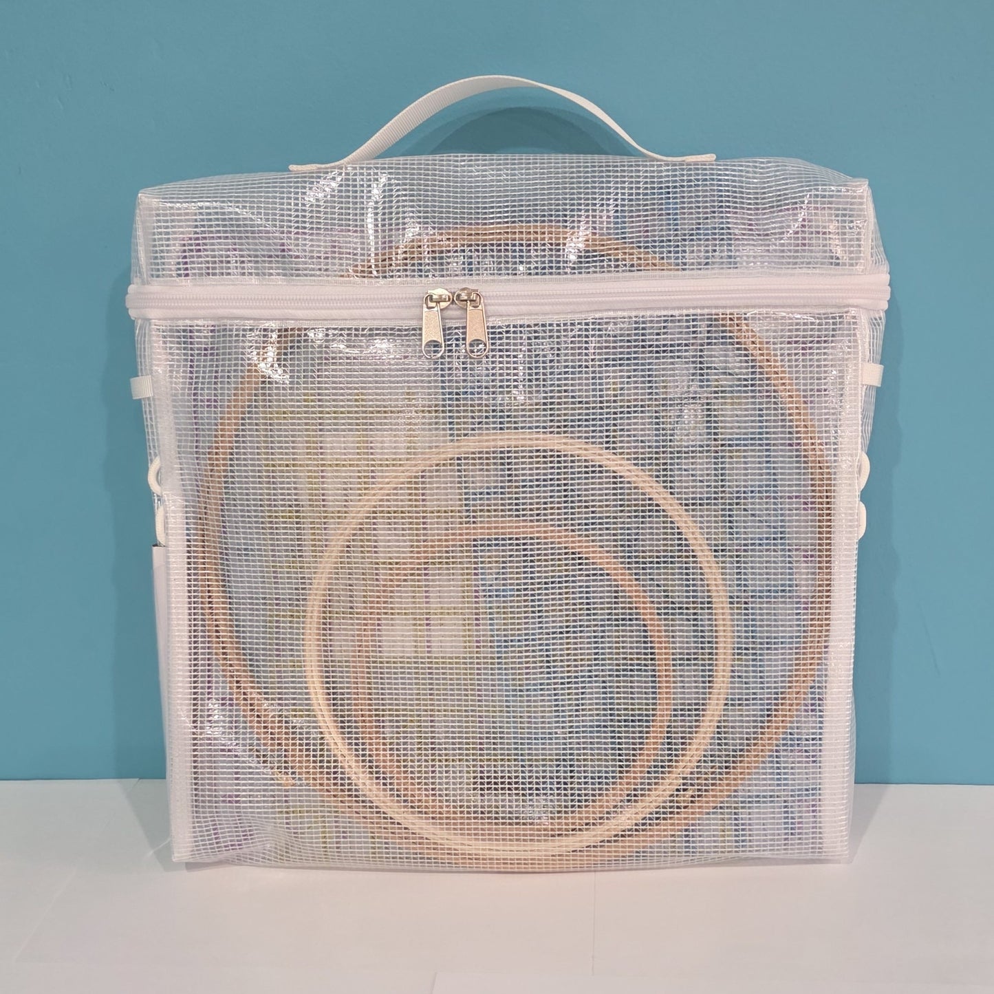 Big Base Pouch used for embroidery hoops and quilting rulers. Closed. 