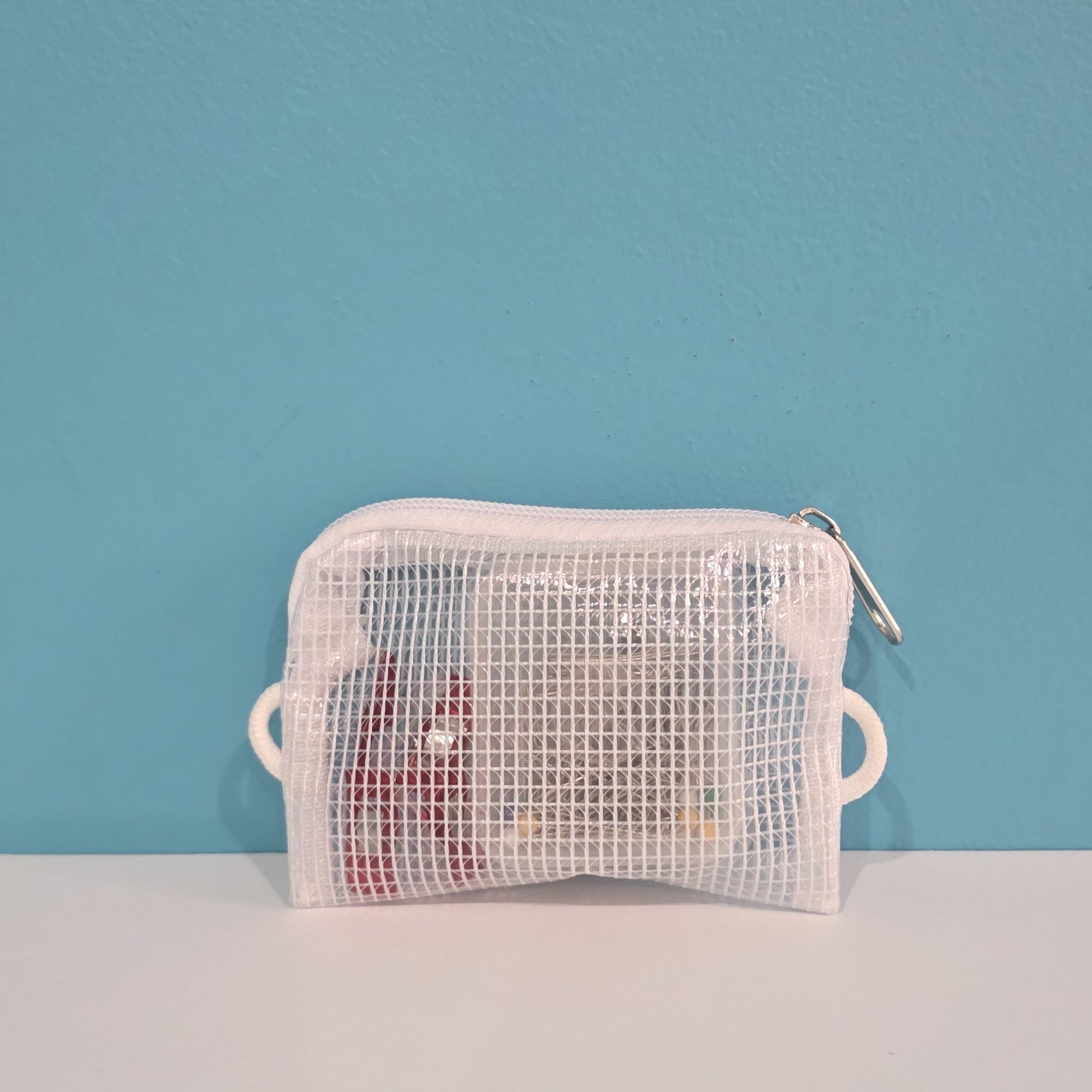 Store sewing clips and measuring tapes in this little pouch.