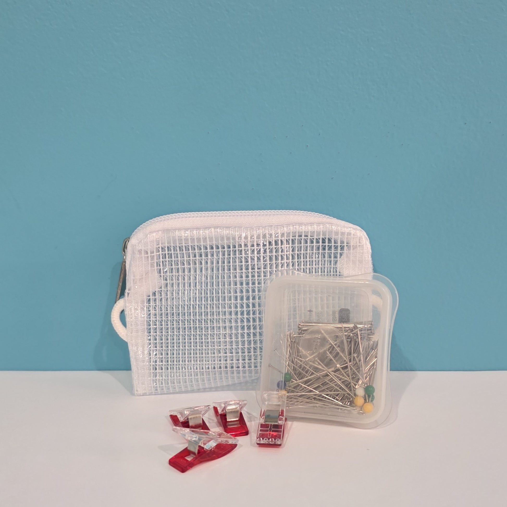 Sewing pins and clips in small ID pouch